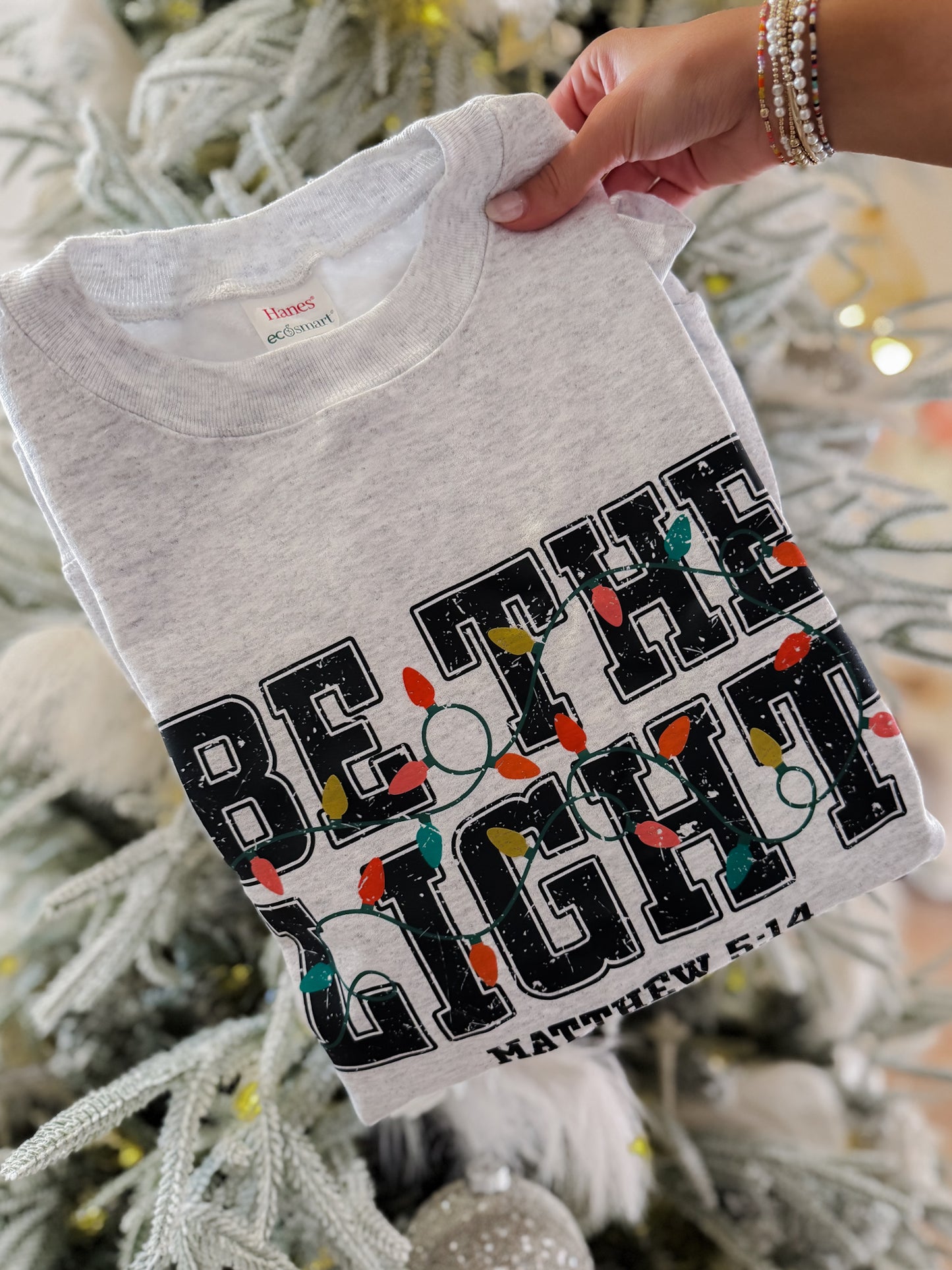 BE THE LIGHT Holiday Sweatshirt