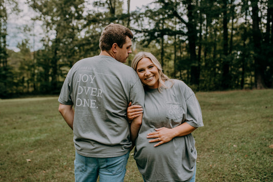 Joy Over One Pocket Tee